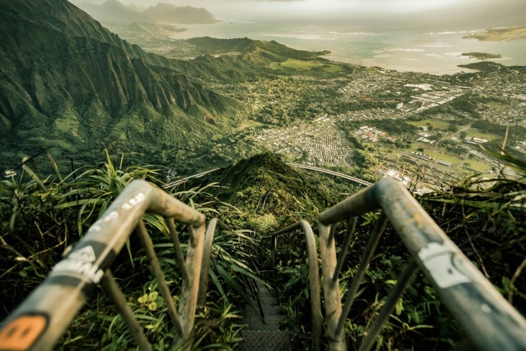 pexels photo 3867818 3867818 From above of stairway leading down to tropical forest with breathtaking view of ocean surrounded with powerful mountains